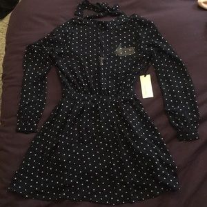 Flirty polka dot, open back dress